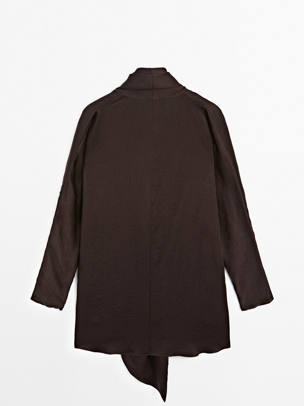 Long flowing blouse with tied neck