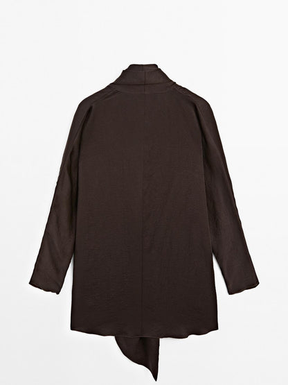 Long flowing blouse with tied neck