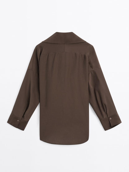 Long shirt with brooch detail