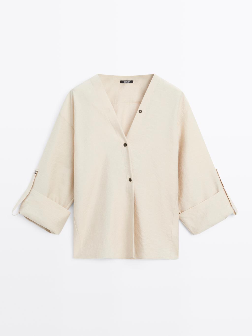 Shirt with rolled-up sleeves