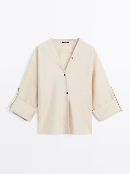 Shirt with rolled-up sleeves