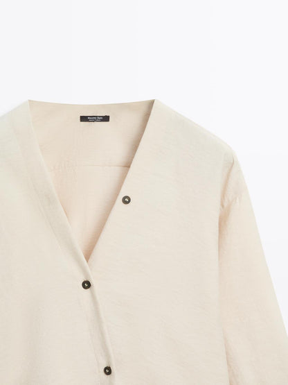 Shirt with rolled-up sleeves