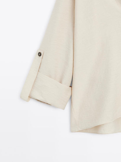 Shirt with rolled-up sleeves