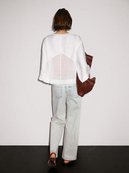 Flowing linen blend blouse with seam details