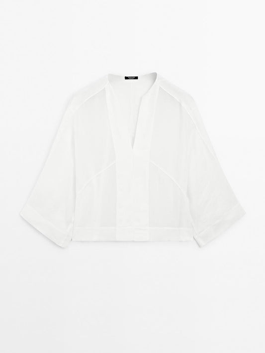 Flowing linen blend blouse with seam details