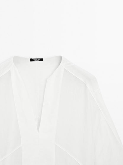 Flowing linen blend blouse with seam details