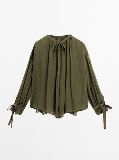 Cape blouse with ties