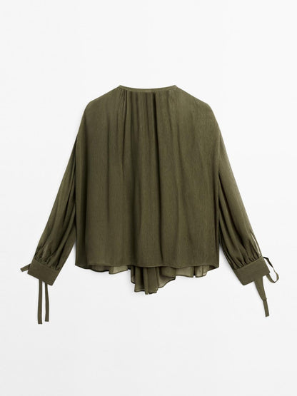 Cape blouse with ties