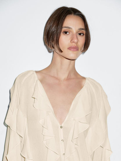 Flowing blouse with ruffles