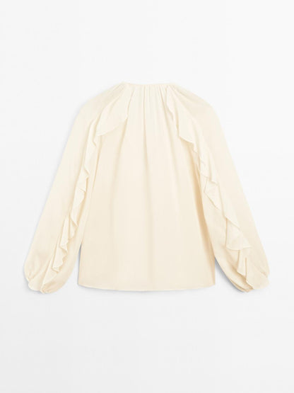 Flowing blouse with ruffles
