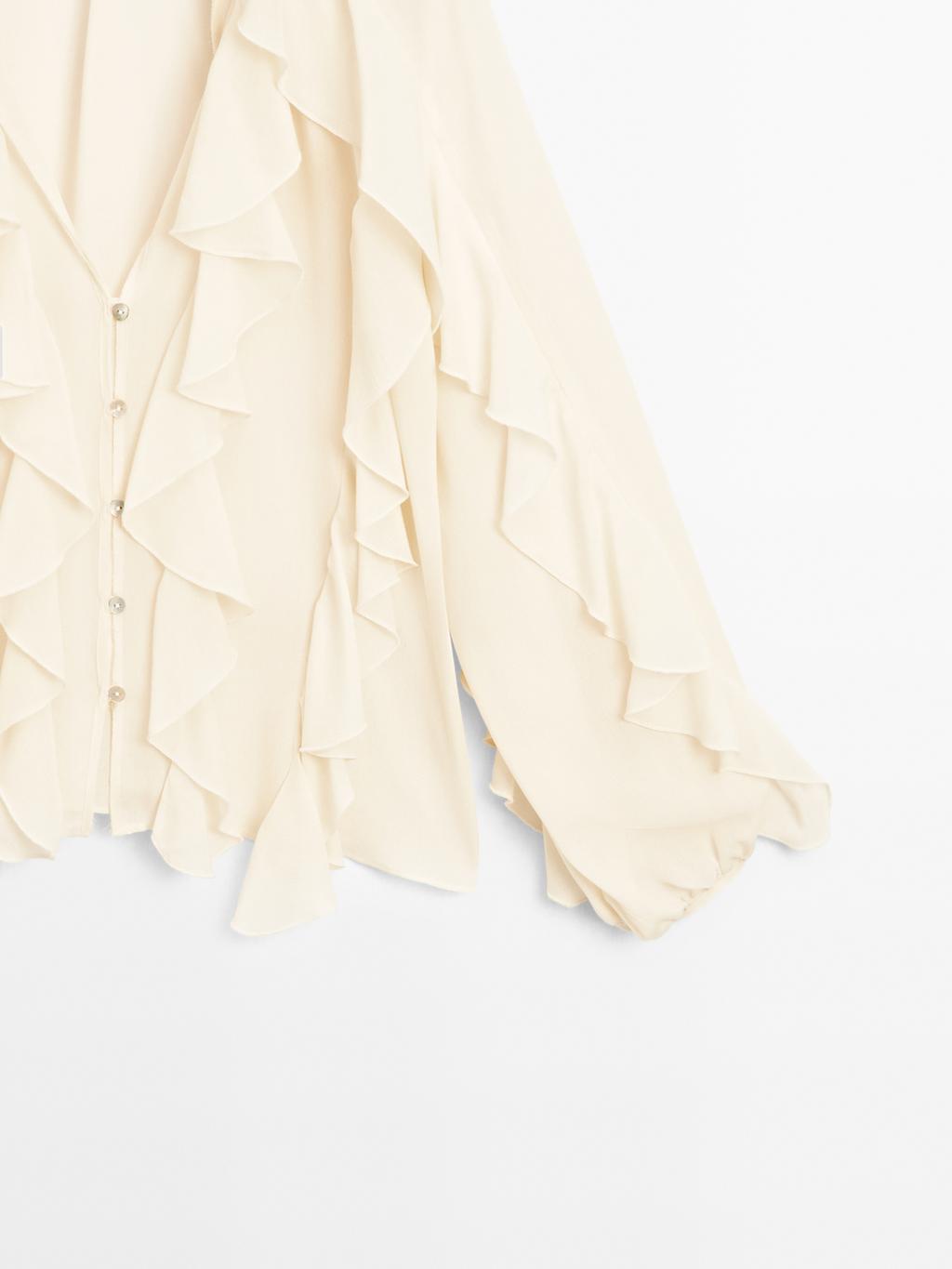 Flowing blouse with ruffles