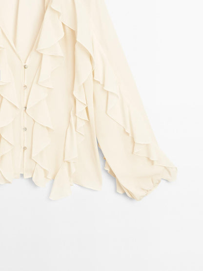 Flowing blouse with ruffles