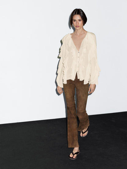 Flowing blouse with ruffles