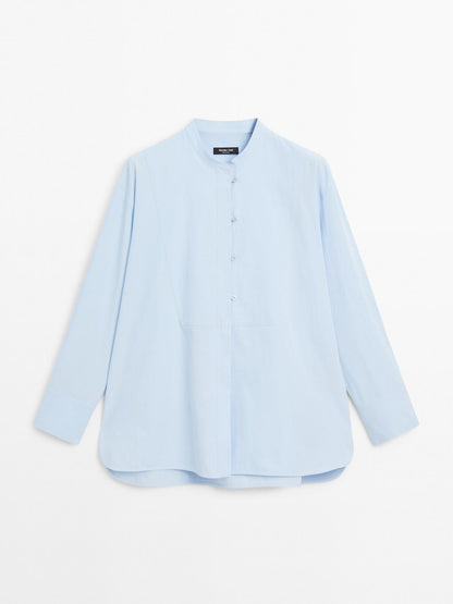 Shirt with stand collar and bib