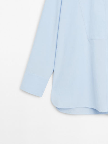 Shirt with stand collar and bib