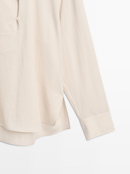 Flowing blouse with button detail