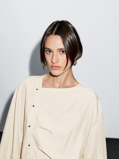 Long sleeve blouse with side button fastening