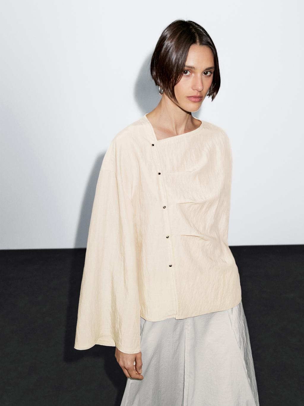 Long sleeve blouse with side button fastening