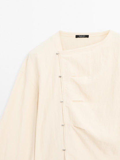 Long sleeve blouse with side button fastening