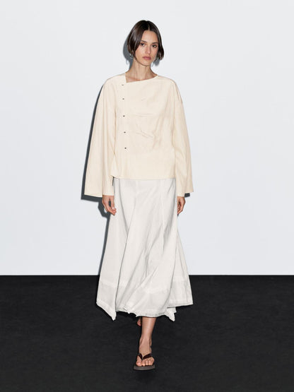 Long sleeve blouse with side button fastening