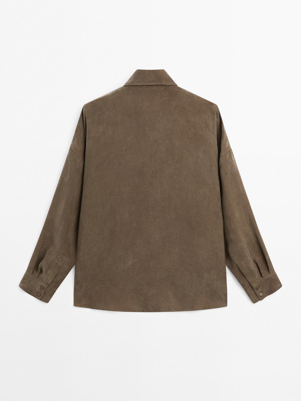 Blouse with zip on the chest