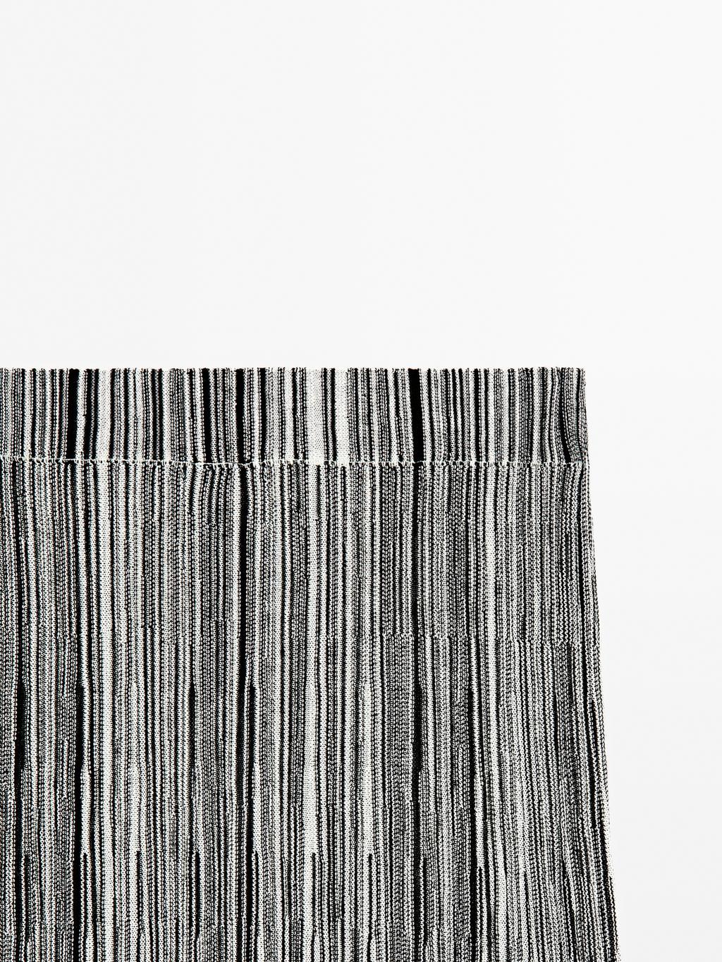 Long knit skirt with striped detail