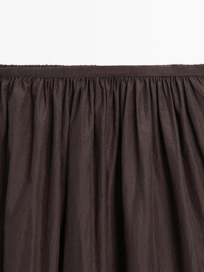 Long skirt with gathered detail