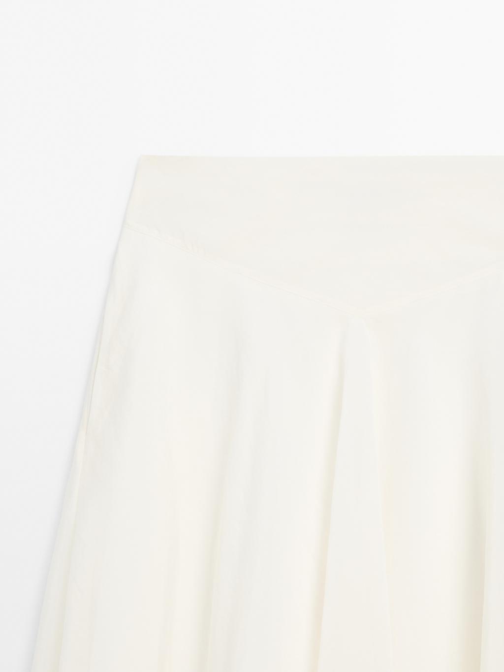 Midi skirt with yoke and flounce