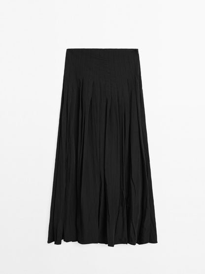 Flowing midi skirt with box pleats