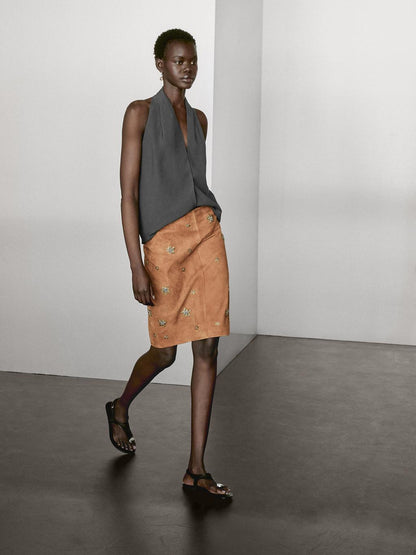 Suede leather skirt with rhinestone detail