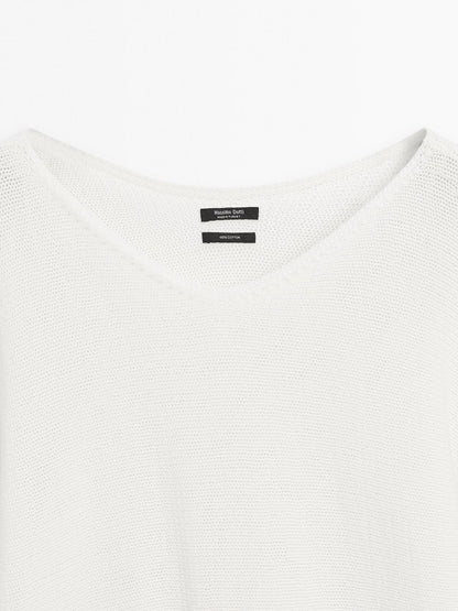 Knit sweater with bow detail