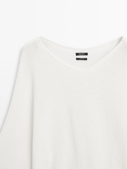 Knit sweater with bow detail