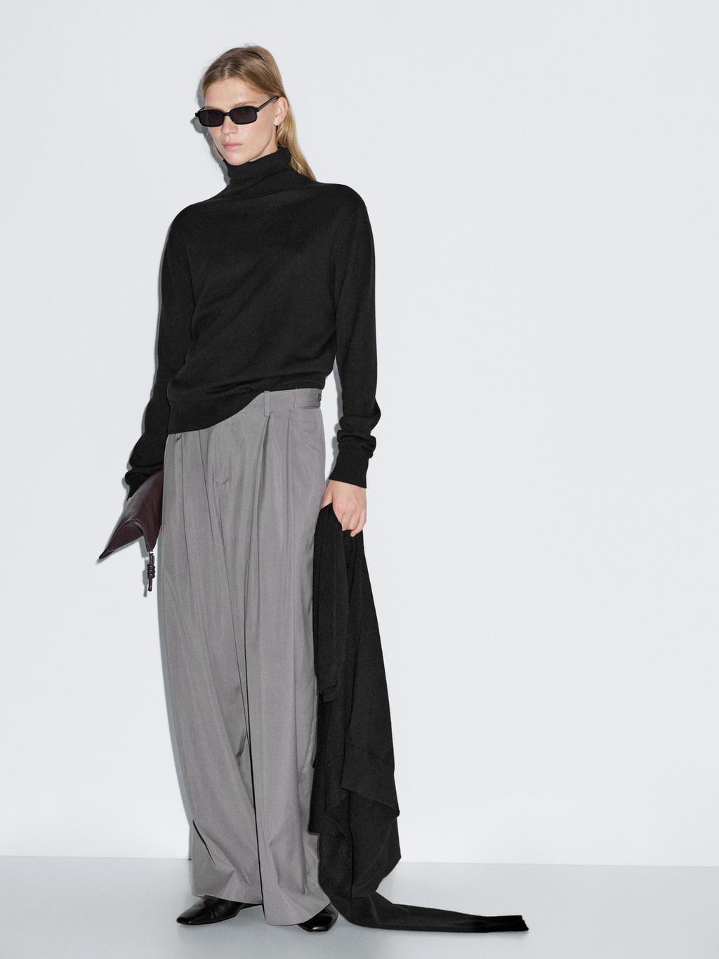 Wool blend knit sweater with high neck