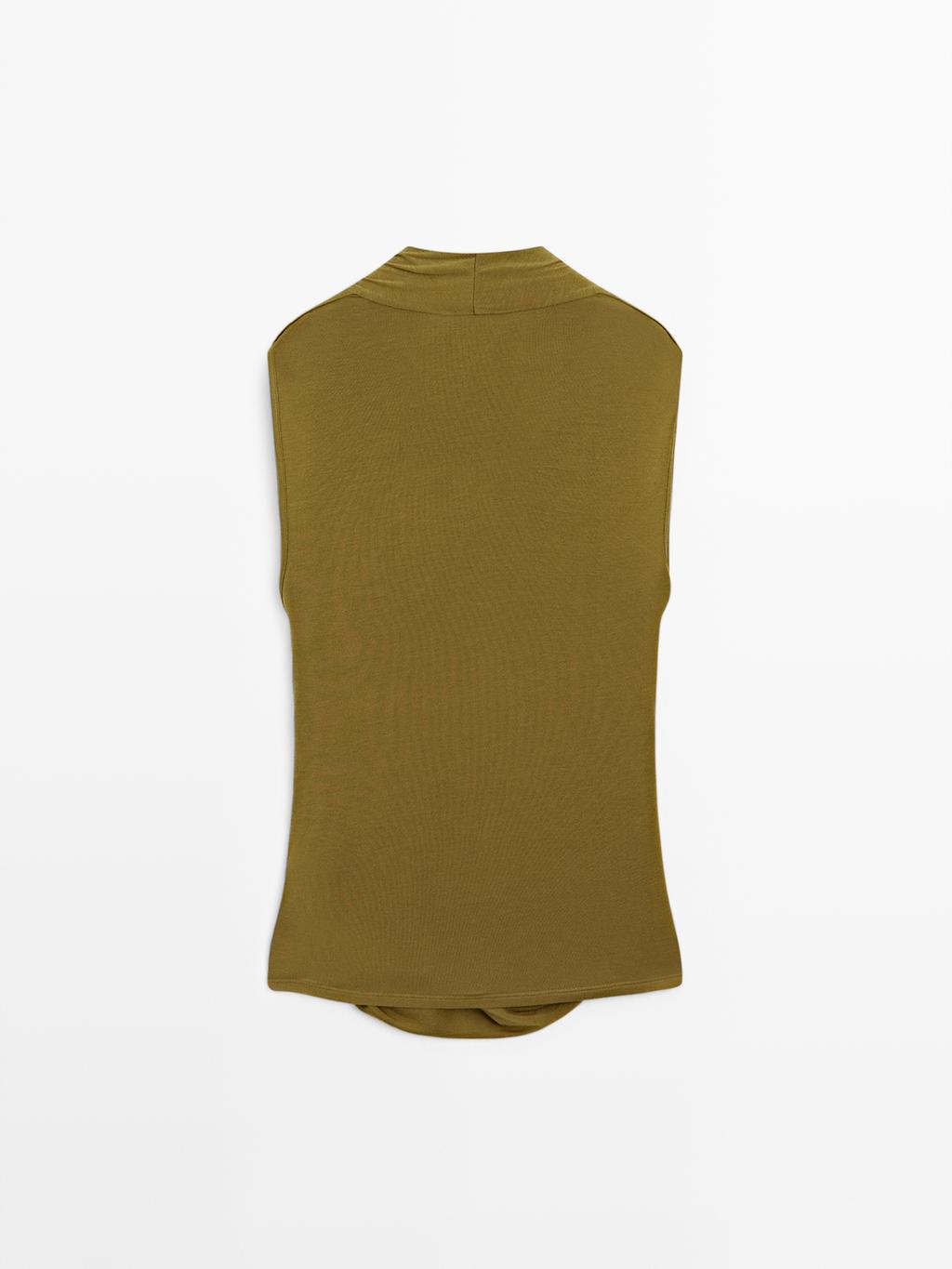 Draped top with surplice neckline