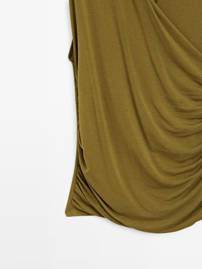 Draped top with surplice neckline