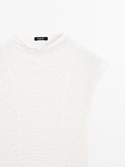 Sleeveless top with gathered detail