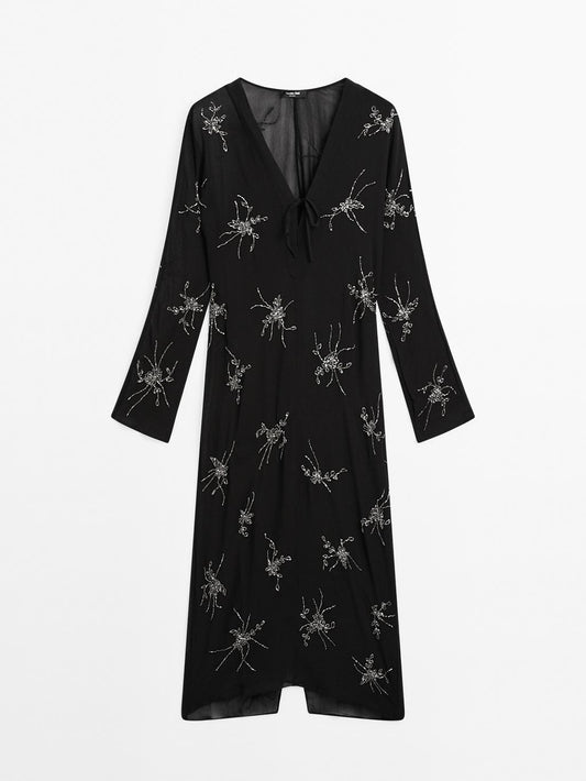 Flowing midi dress with embroidery