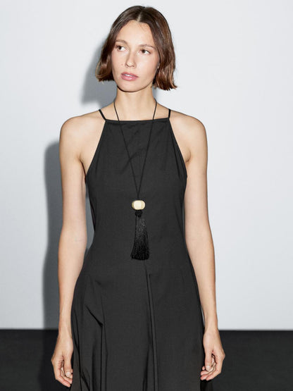 Long halter neck dress with flounce