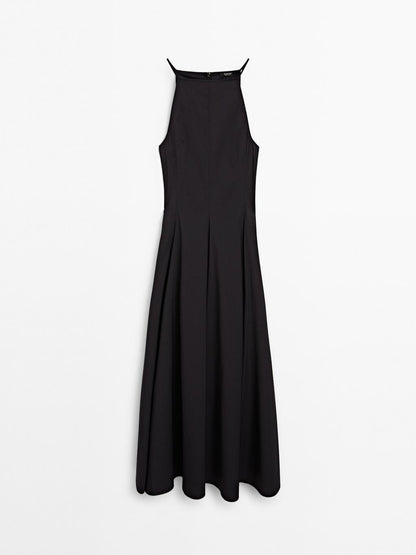 Long halter neck dress with flounce