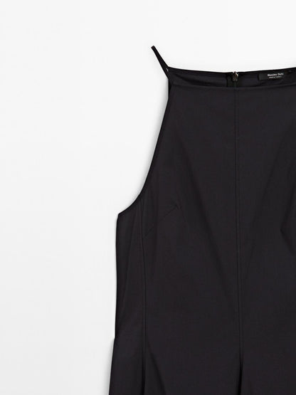 Long halter neck dress with flounce