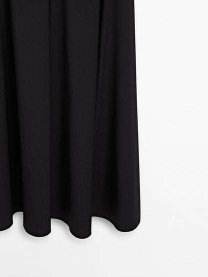 Long halter neck dress with flounce