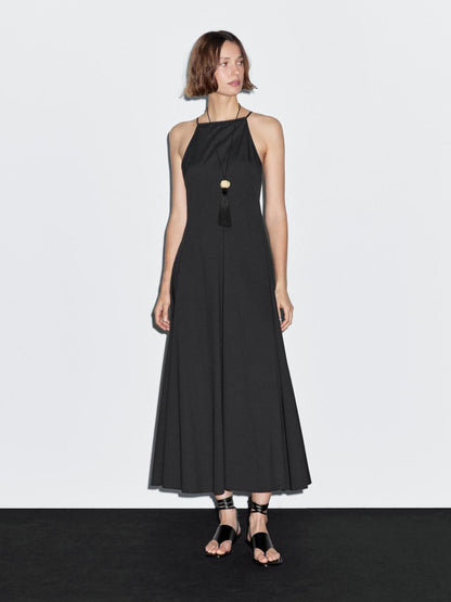 Long halter neck dress with flounce