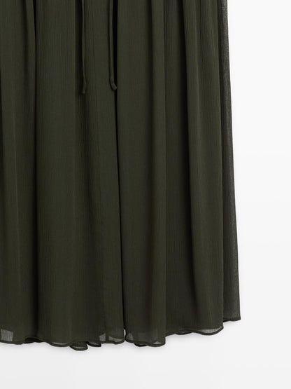 Long flowing dress with ruffle detail