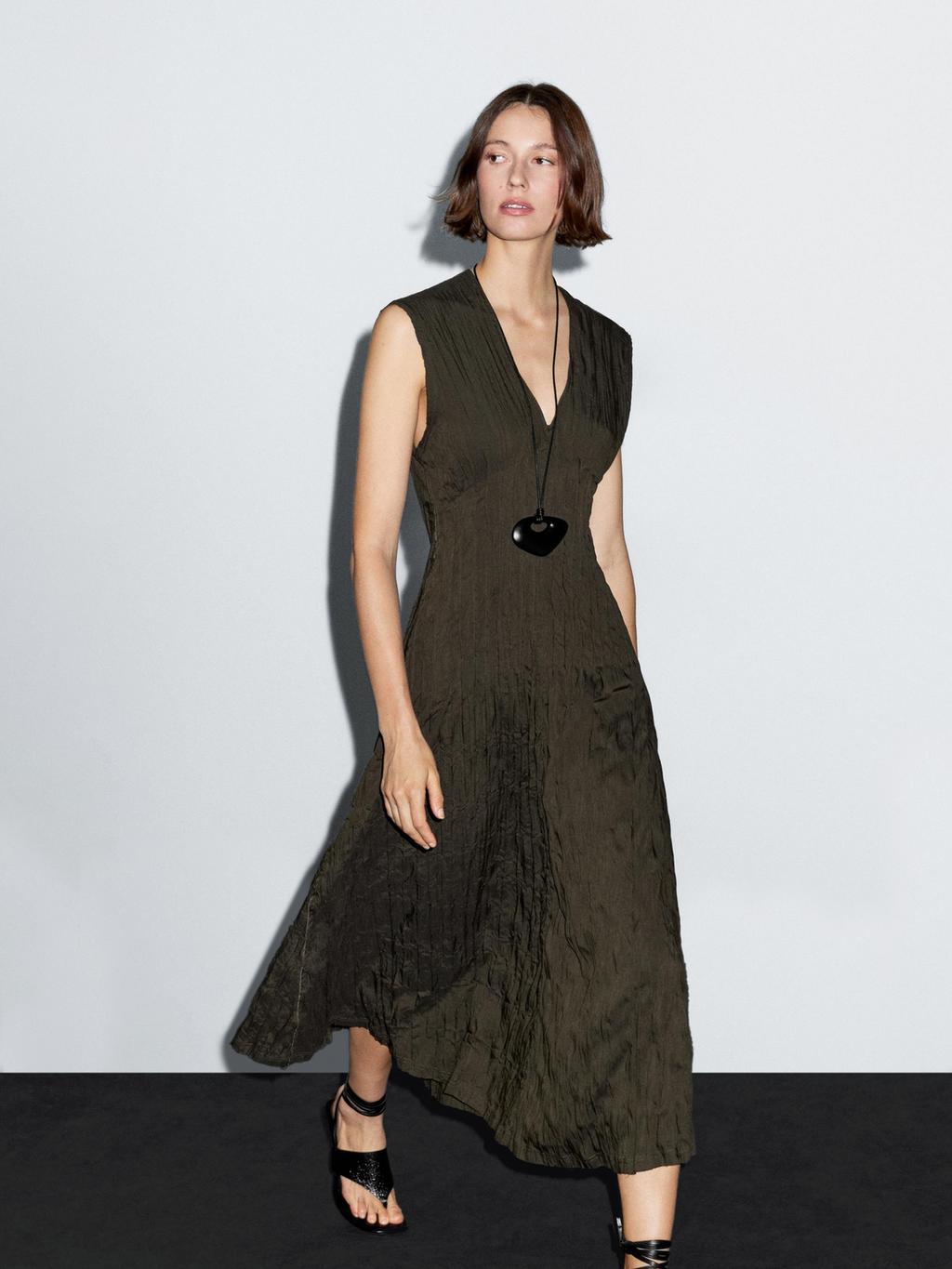 Creased-effect long pleated dress