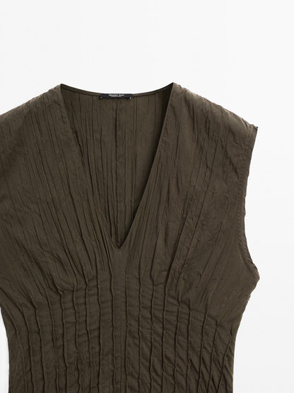 Creased-effect long pleated dress