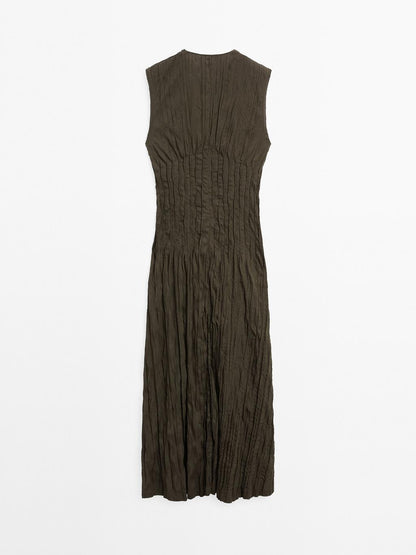 Creased-effect long pleated dress