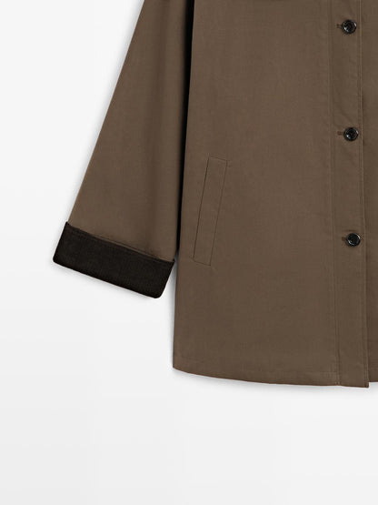 Waxed high neck parka with corduroy detail