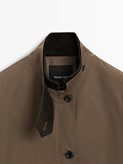 Waxed high neck parka with corduroy detail