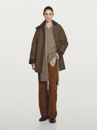 Waxed high neck parka with corduroy detail