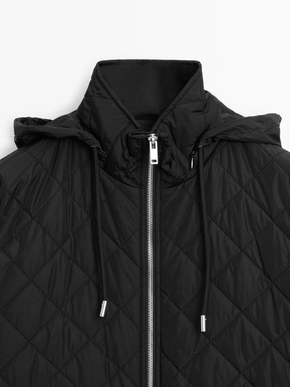 Long water-repellent oversize quilted parka